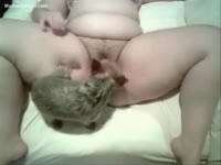 Fat Asian milf enjoys the tongue of her little dog